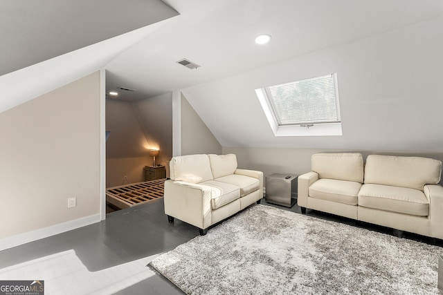 living room featuring lofted ceiling with skylight