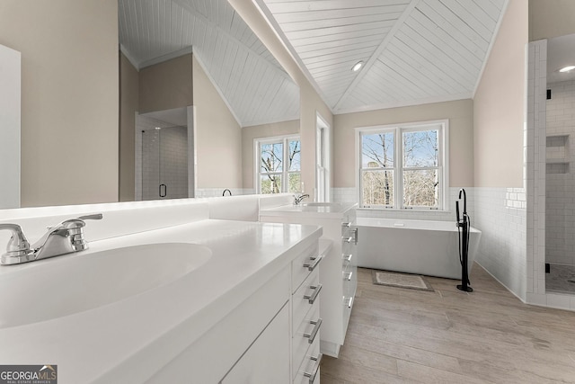 bathroom with vanity, tile walls, wooden ceiling, plus walk in shower, and hardwood / wood-style floors