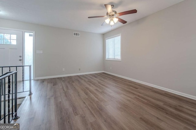 interior space featuring ceiling fan and wood-type flooring