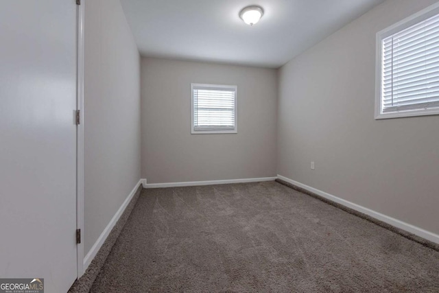 view of carpeted spare room