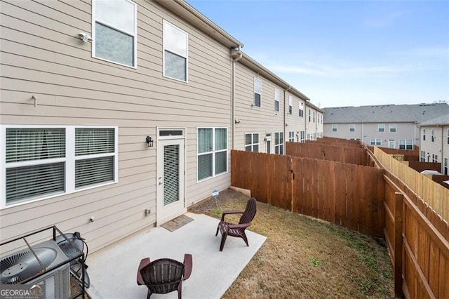 back of property featuring a patio area