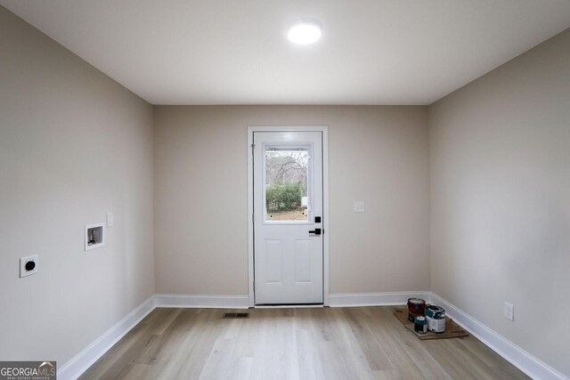 bedroom with light hardwood / wood-style flooring