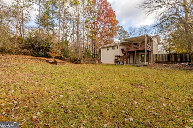 view of yard featuring a deck