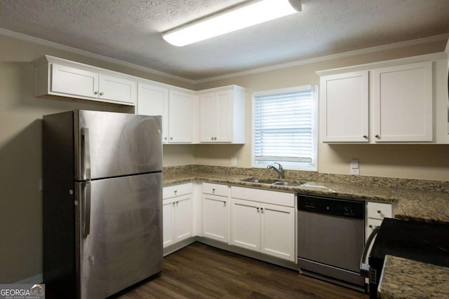 kitchen with sink, stainless steel appliances, crown molding, a textured ceiling, and white cabinets