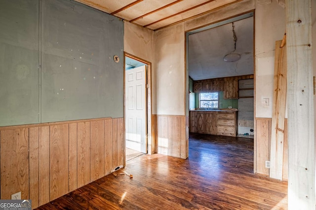 unfurnished room with hardwood / wood-style flooring