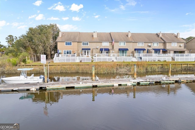 view of dock with a water view