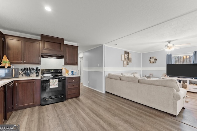 kitchen with light hardwood / wood-style floors, dark brown cabinets, black appliances, and ventilation hood