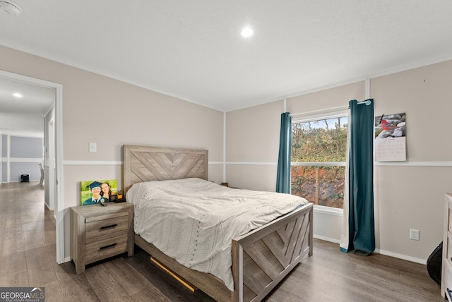 bedroom featuring wood-type flooring