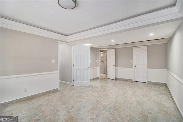 spare room featuring ornamental molding