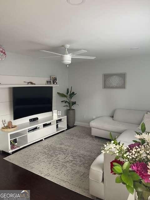 living room with ceiling fan