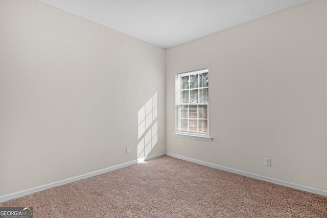 empty room featuring carpet flooring