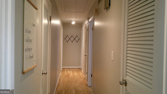 hallway featuring light wood-type flooring