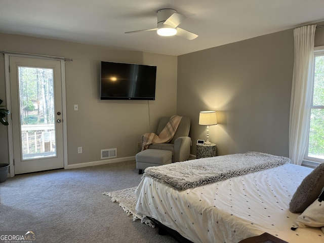 carpeted bedroom with access to outside and ceiling fan