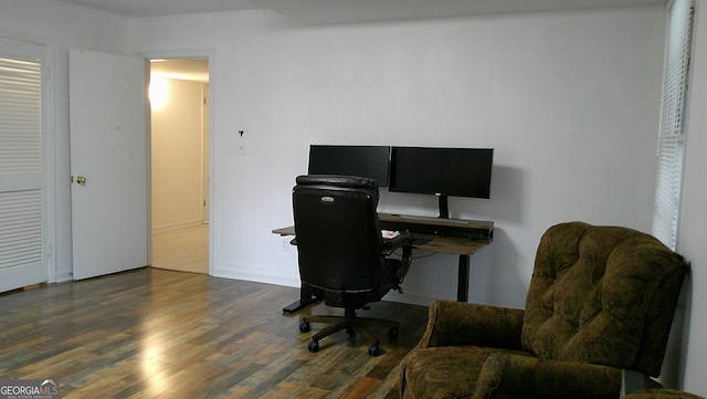 office space featuring dark wood-type flooring