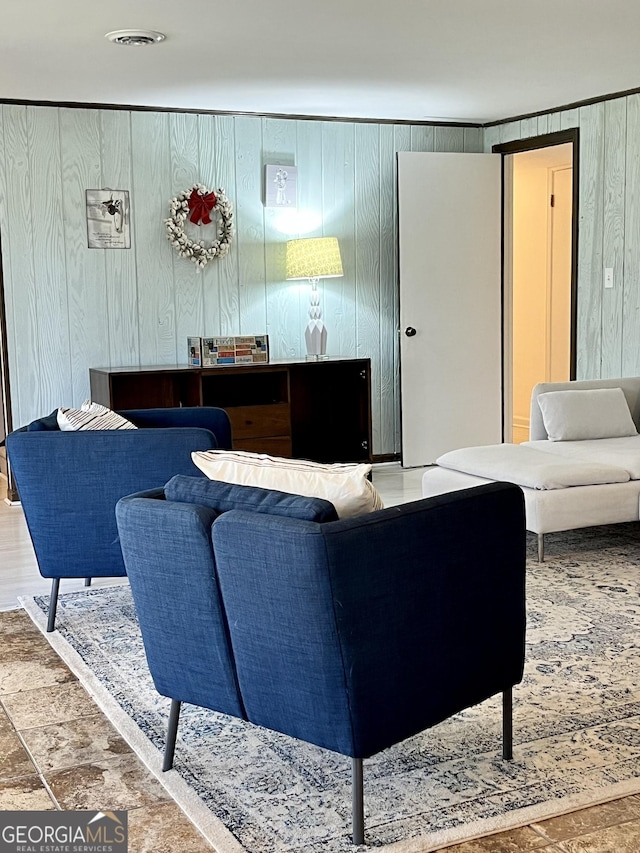 living room featuring wooden walls