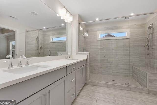 full bathroom featuring vanity, toilet, and tiled shower / bath