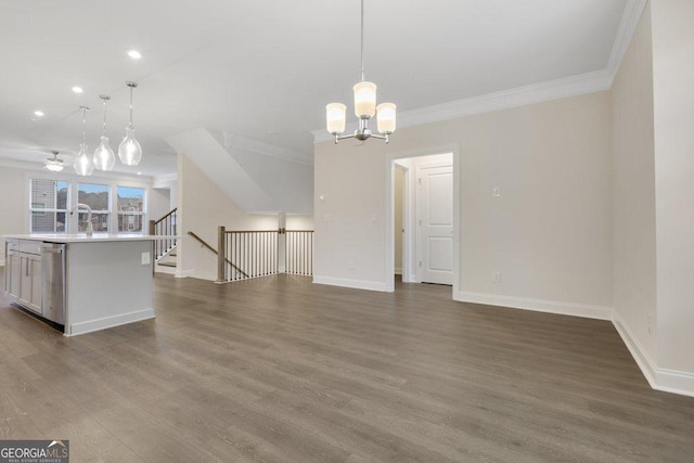 interior space with a chandelier, hardwood / wood-style flooring, and crown molding