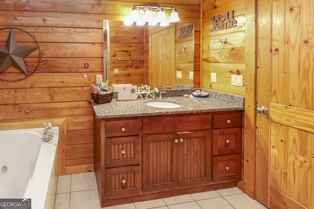 bathroom featuring tile patterned flooring, vanity, a bath, and wooden walls