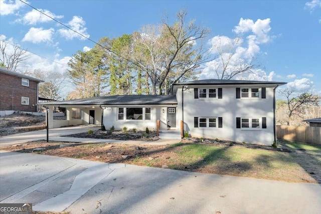 view of front facade with a carport