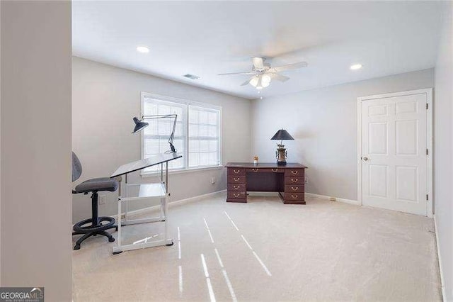 home office featuring ceiling fan and light carpet