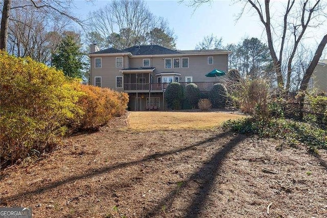 view of yard with a sunroom