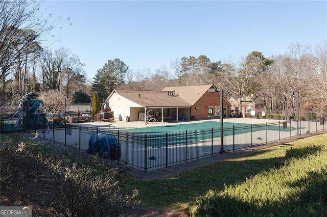 view of swimming pool with a patio area