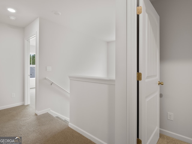 corridor featuring carpet floors