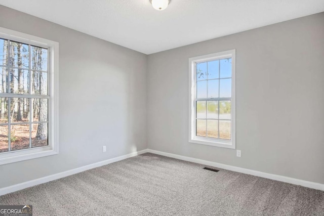 view of carpeted spare room