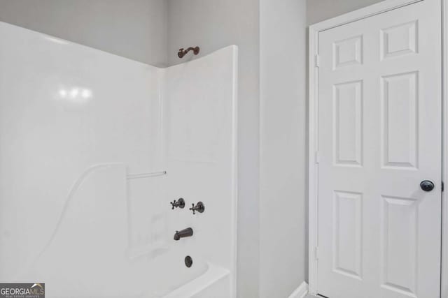 bathroom with shower / bathing tub combination