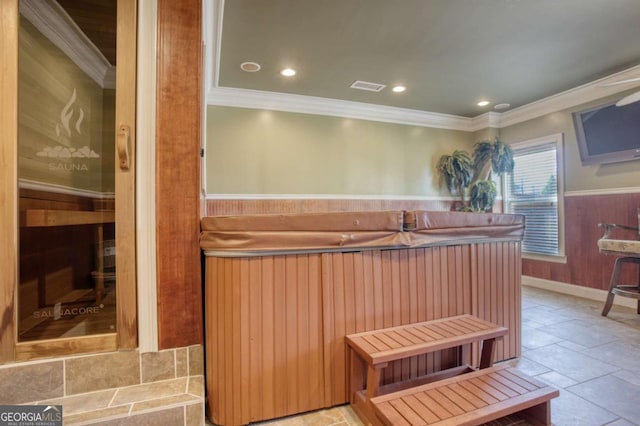 kitchen with crown molding and wooden walls