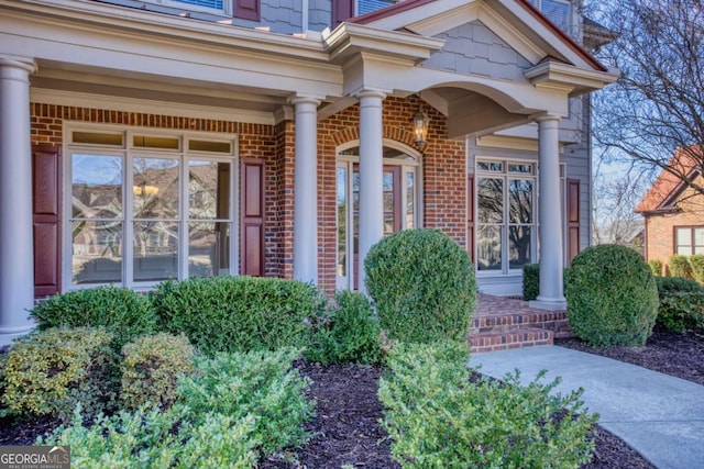 doorway to property with a porch