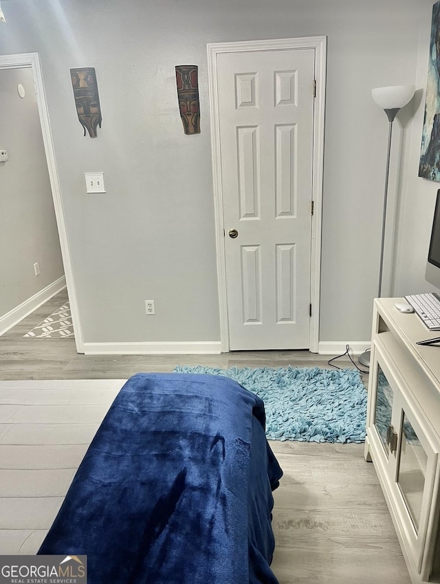 bedroom featuring light hardwood / wood-style floors