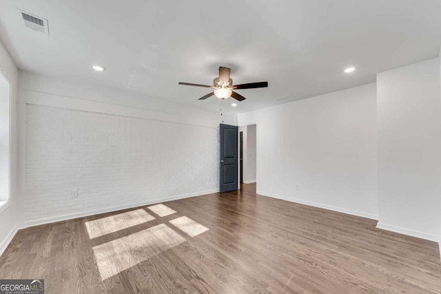 unfurnished room featuring wood-type flooring and ceiling fan