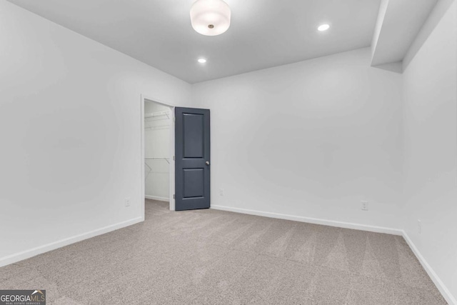 spare room featuring carpet floors