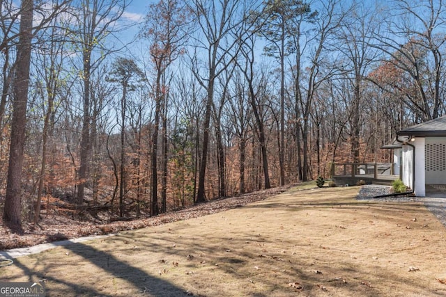 view of yard with a deck