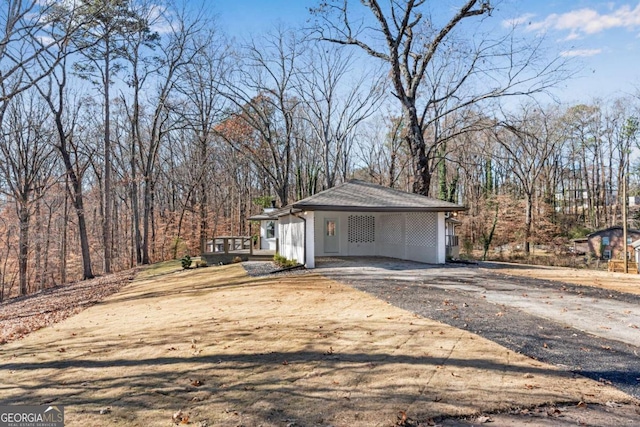 exterior space featuring a carport