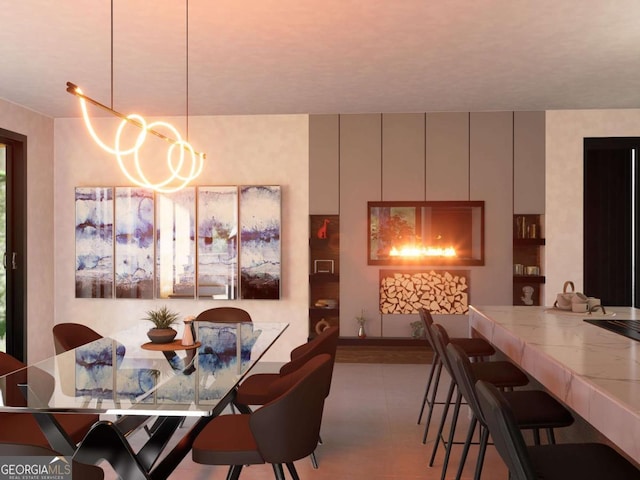 dining area with an inviting chandelier