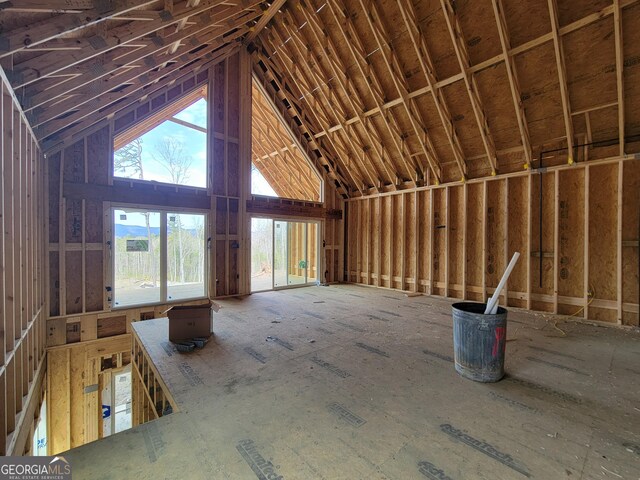 misc room featuring high vaulted ceiling