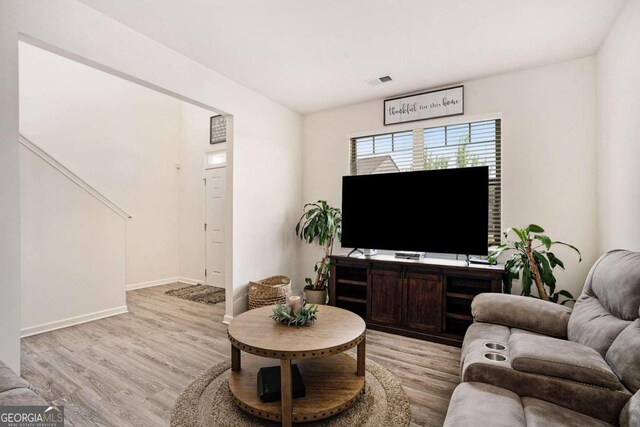 living room featuring light hardwood / wood-style floors