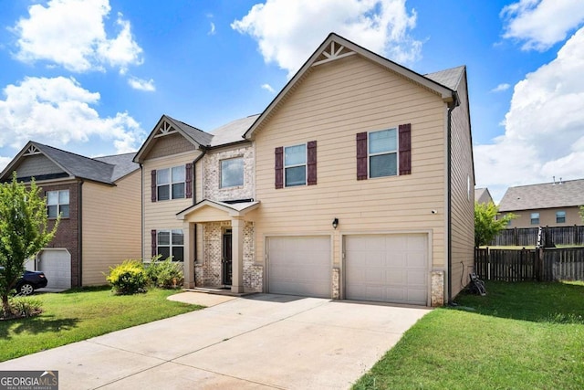 view of front of home featuring a front lawn and a garage