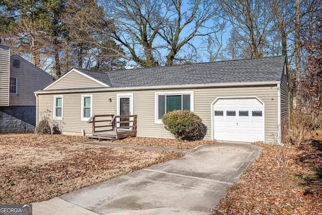 single story home featuring a garage