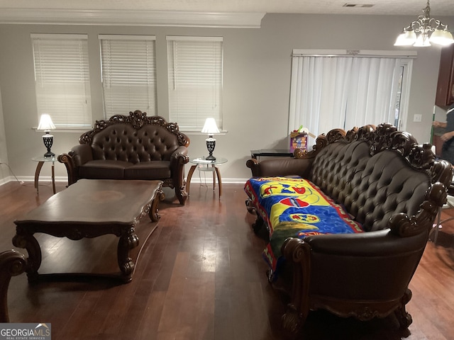 living room featuring hardwood / wood-style floors and a chandelier