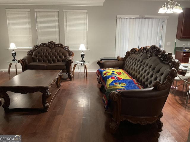 living room featuring a chandelier and hardwood / wood-style flooring