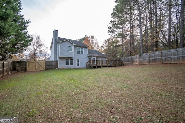 view of yard featuring a deck