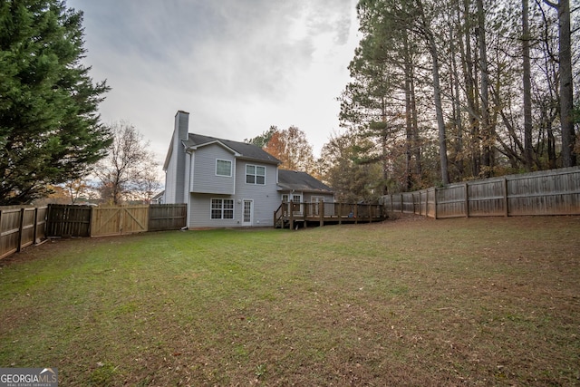 view of yard with a deck