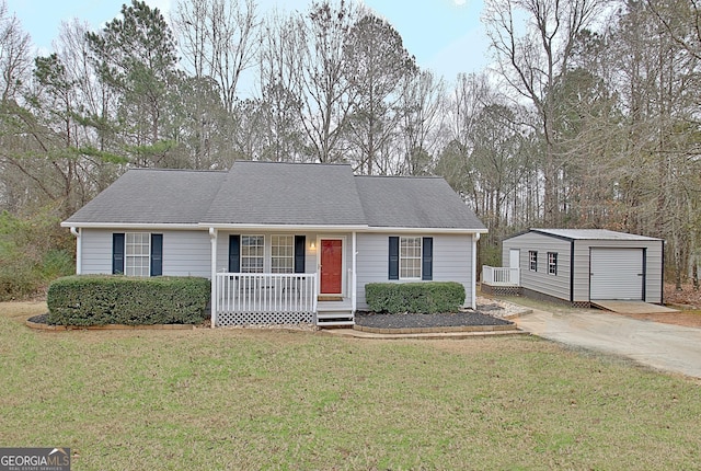 view of front of home with a porch, a garage, an outdoor structure, and a front lawn