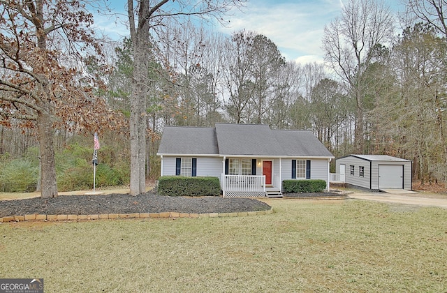 ranch-style house with a porch, a front lawn, an outdoor structure, and a garage