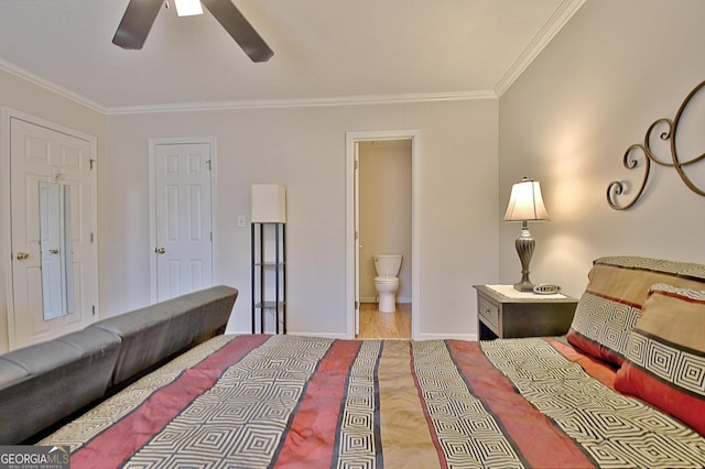 bedroom featuring ensuite bath, ceiling fan, and crown molding