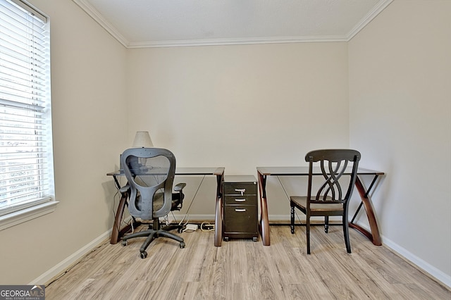 home office featuring crown molding and light wood-type flooring