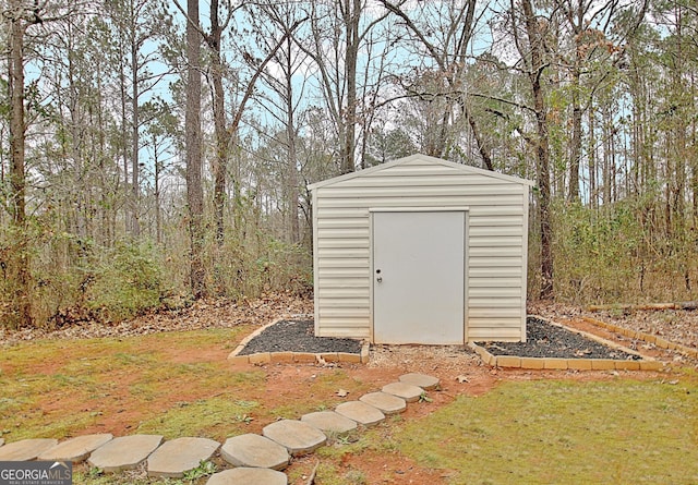 view of outdoor structure with a yard